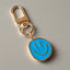 blue smiley face keychain