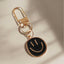 black smiley face keychain