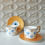 evil eye coffee mug and saucer