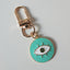 green evil eye keychain