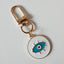 white evil eye keychain